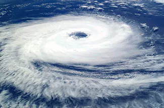 A photograph of a hurricane, showing the rotation around its eye.