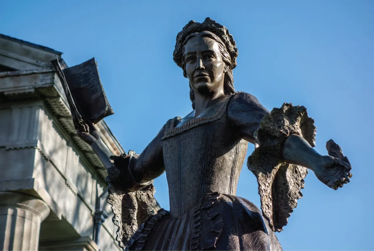 A bronze satue of Mercy Otis Warren