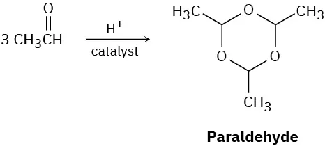 Three acetaldehyde molecules react with proton catalyst giving paraldehyde, where three carbon atoms of cyclohexane ring are replaced with oxygen. Three methyl groups are connected to carbon atoms in ring.