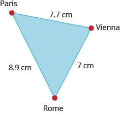 The figure is a triangle formed by Paris, Vienna, and Rome. The distance between Paris and Vienna is 7.7 centimeters. The distance between Vienna and Rome is 7 centimeters. The distance between Rome and Paris is 8.9 centimeters.