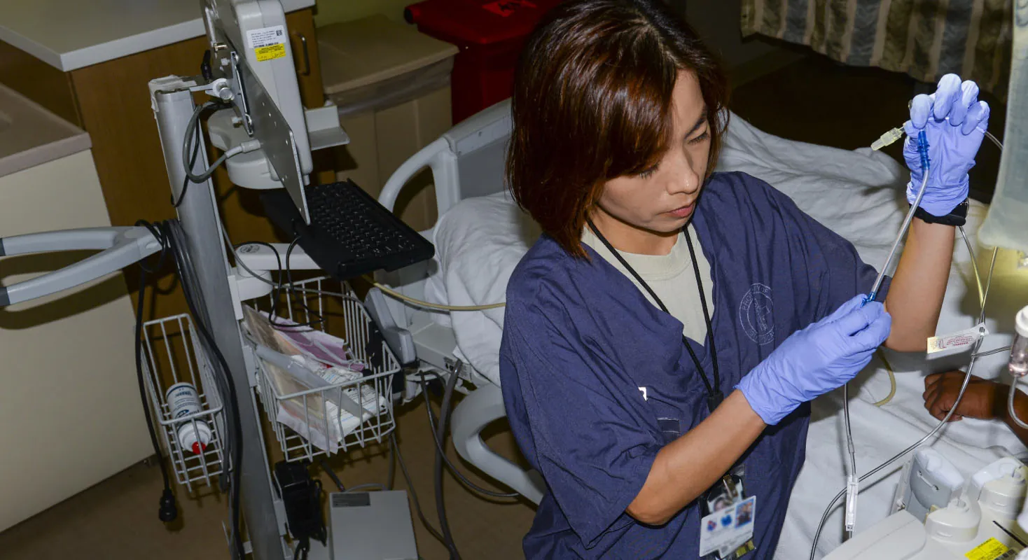 Photo of patient in hospital bed