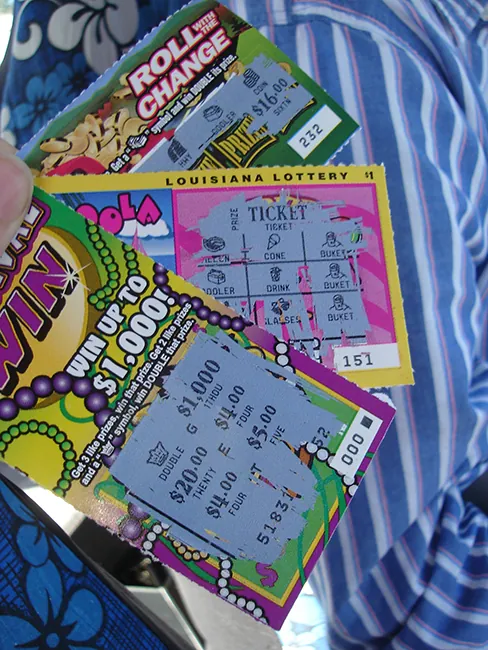 Three lottery tickets have been scratched off to reveal the ticket-holder's winnings.