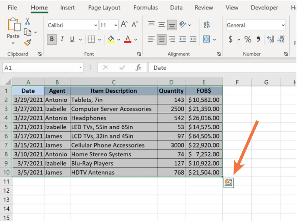 A spreadsheet of information is selected and an arrow points to a small square icon located at the bottom right of the data with a lightning bolt inside.