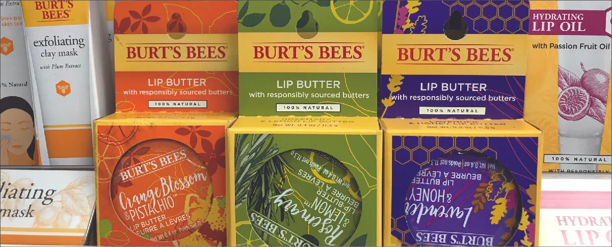 Photo of Burt’s Bees products, including lip butter, exfoliating clay mask, and lip oil.