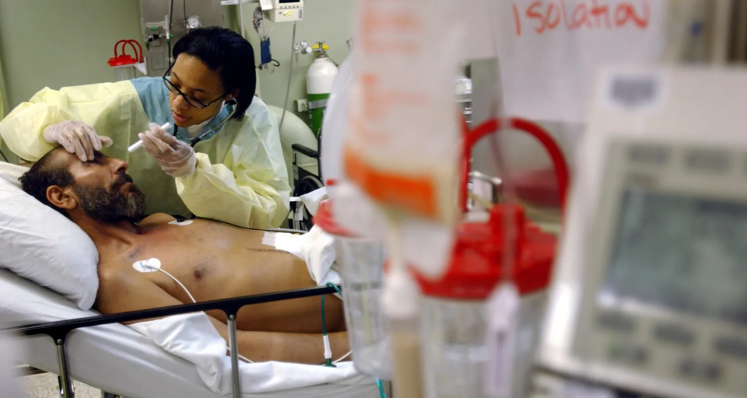 A photo of a nurse evaluating a patient’s gaze.