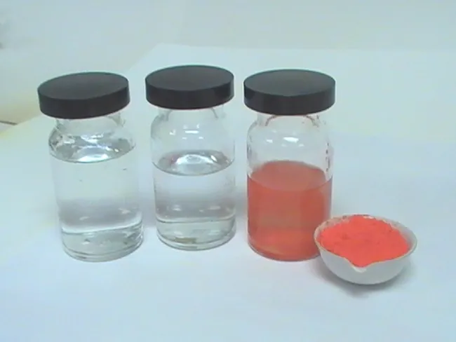 This figure shows three bottles and one bowl. All the bottles have lids. The first bottle is filled with a clear liquid. The second bottle is filled with a similarly clear liquid, but only about three-quarters of the way. The third bottle contains a red or pink liquid. The bowl contains a red or pink solid.