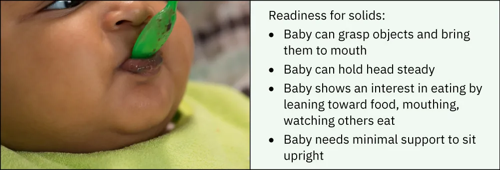 Image of infant eating. Readiness for solids: Baby can grasp/bring to mouth, hold head steady, show interest in eating (leaning toward food, mouthing, watching others eat), minimal support to sit upright.