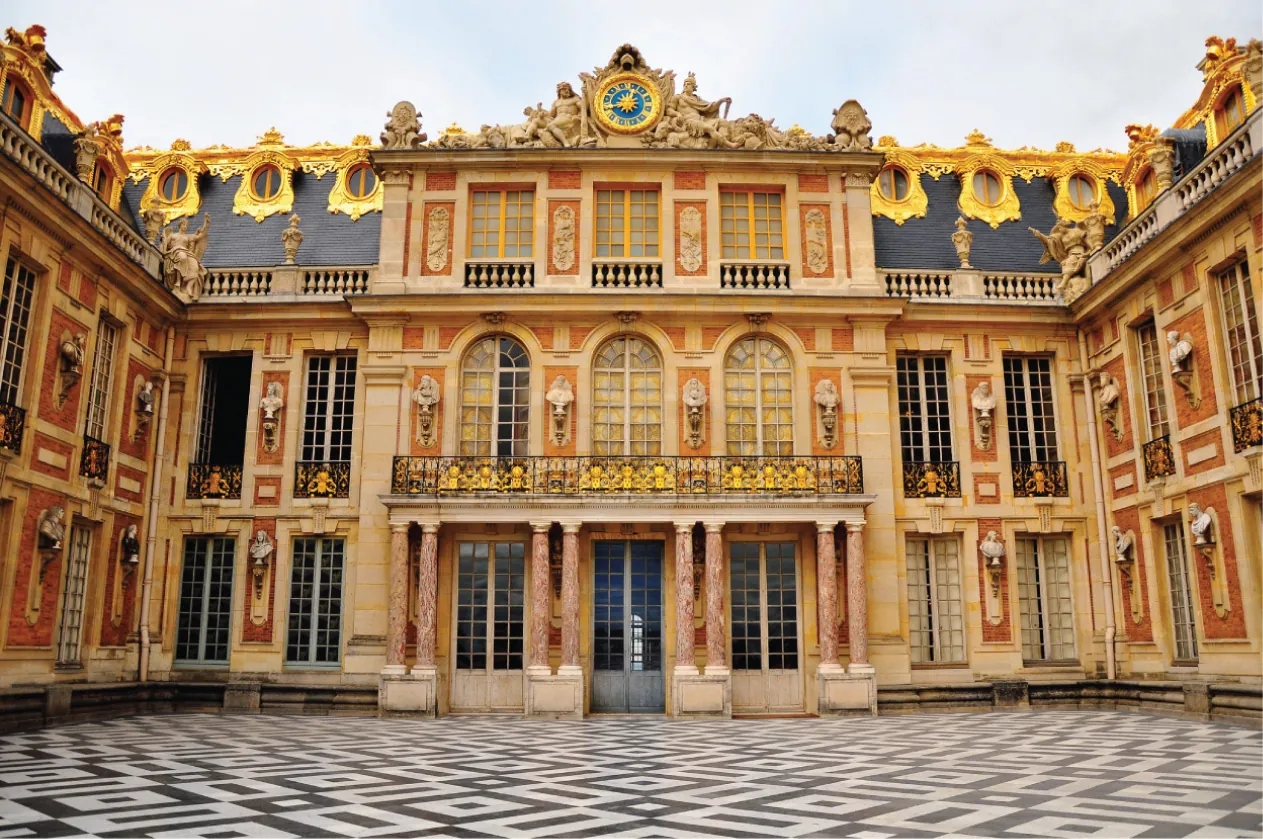 A picture of the Marble Court in the Versailles Palace in France. 