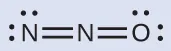Se muestra una estructura de Lewis. Un átomo de nitrógeno con un par solitario de electrones está unido por triple enlace con un átomo de nitrógeno que está unido por enlace simple con un átomo de oxígeno con tres pares solitarios de electrones.