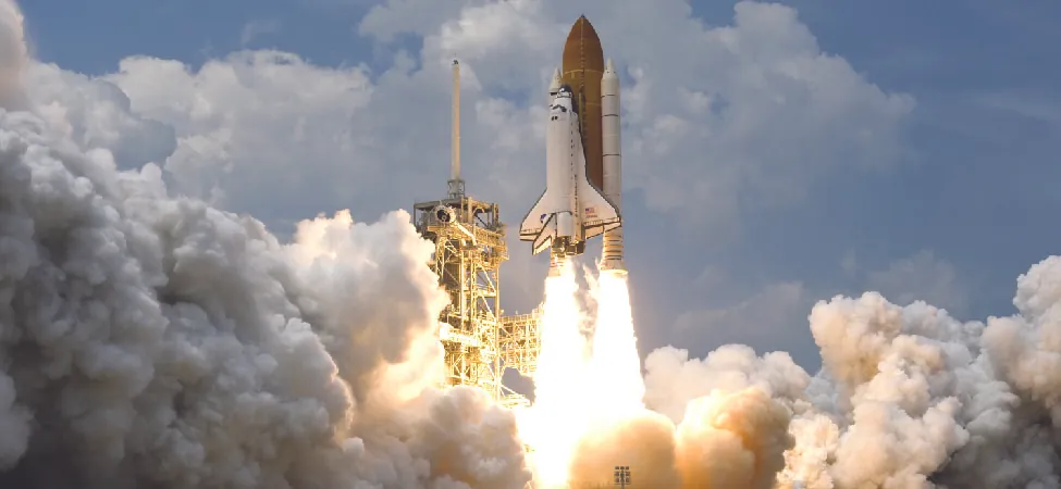 A photo of a rocket ship being launched into space.