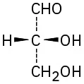 The structure shows a central carbon bonded with hydrogen (wedge-bonded), a hydroxyl group (wedge-bonded), a hydroxymethyl group (dashed-bonded), and C H O group (dashed-bonded).