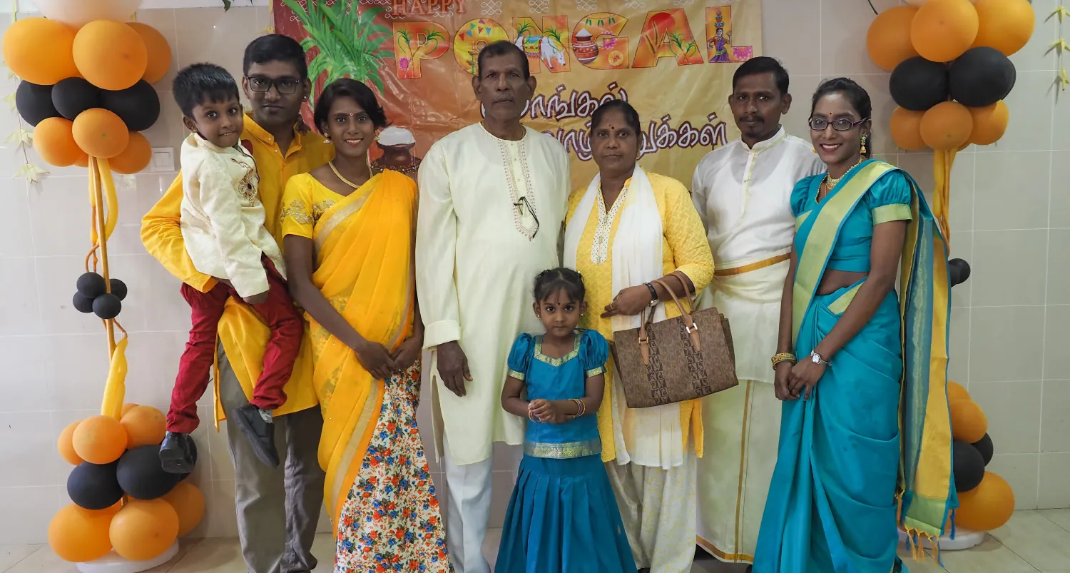 Photo of a multigenerational family at a celebration.