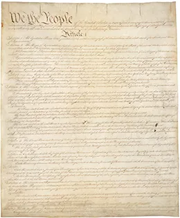 The first page of the U.S. Constitution is shown.