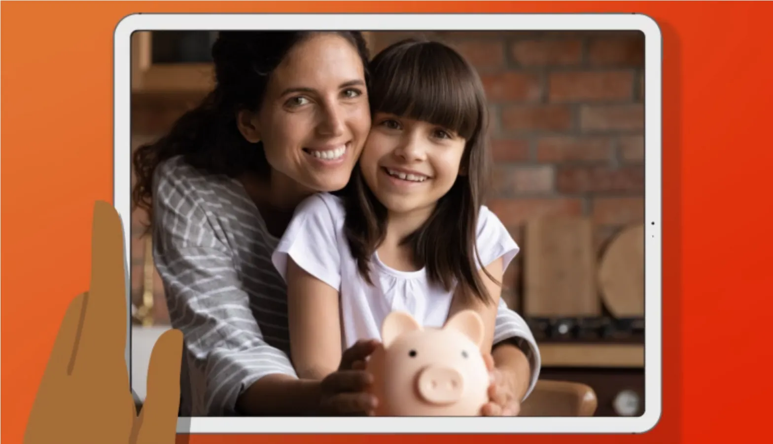 A woman and a young girl smile while holding a piggy bank together, as seen on a tablet screen held by a hand. The background includes a kitchen with warm lighting and a brick wall.