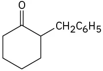 The structure of 2-benzylcyclohexanone where a carbonyl group is at C1 of a cyclohexane ring, and a benzyl group is attached to C 2 of the ring.