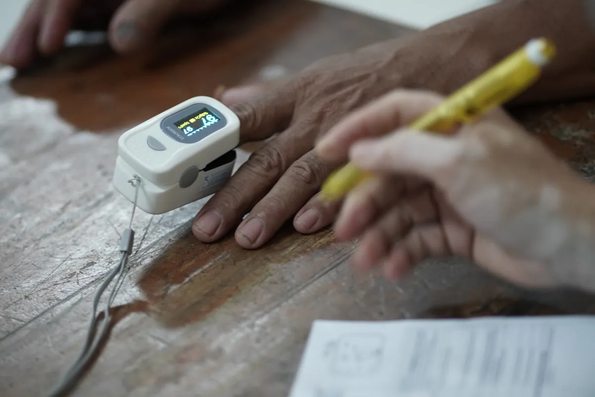 Pulse oximeter attached to patient's finger
