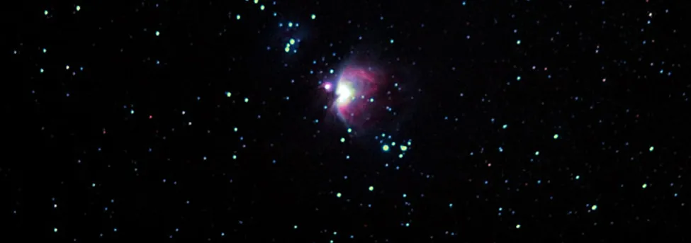 A photo shows a star system, the Orion Nebula.