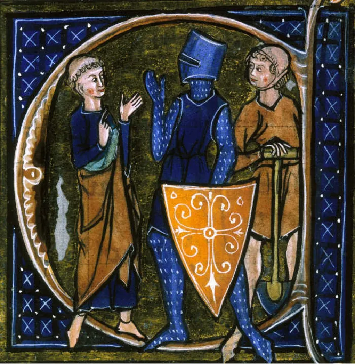 A vibrant picture is shown of three figures on a dark green background inside a brown and white letter “a” on a blue square with white “x” marks and dots throughout. The figure on the left is bald except for a ring of curly brown hair around his head, has rosy cheeks and lips, wears a long blue and brown robe and is barefoot. He faces to the right where a warrior stands with an orange upside down triangle shield with white designs. He wears a dark blue helmet covering his entire face, a dark blue sleeveless shirt with his neck, arms, and legs covered with blue stockings with white dots all over. Behind the warrior stands a figure with short hair, rosy cheeks and lips, wearing a helmet with a strap under the chin. He wears short brown robes, is barefoot, and holds a shovel in front of him facing the warrior.