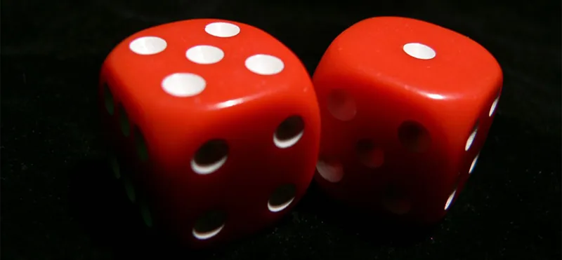 Two red dice are shown. The first die shows 5 and the second die shows 1.
