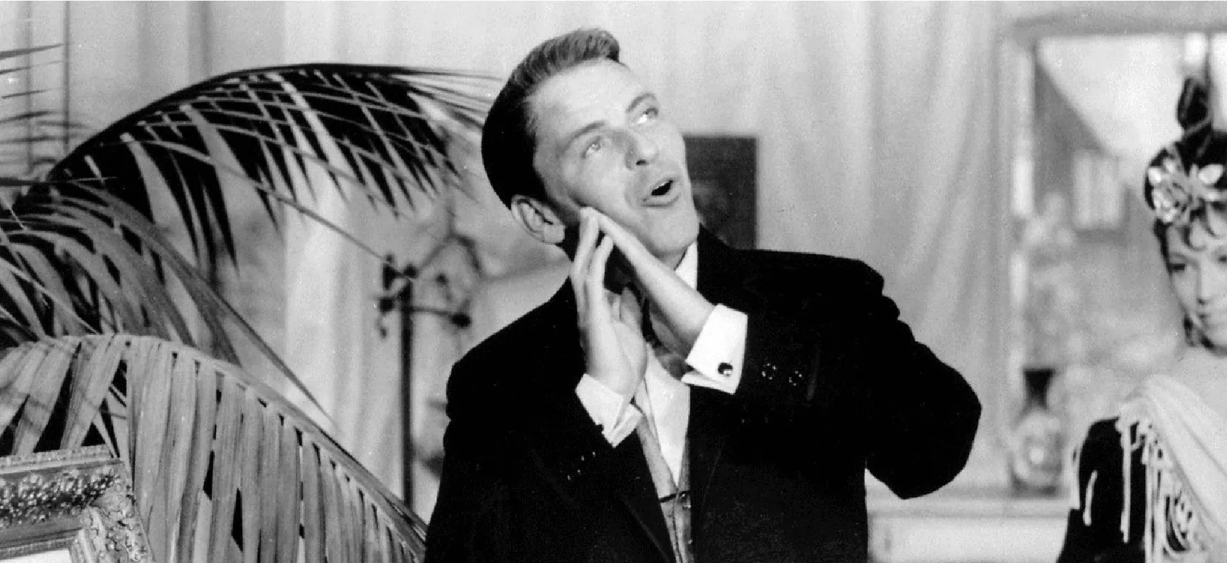 Frank Sinatra sings in a movie musical. Sinatra was the subject of ground-breaking profile by writer Gay Talese.