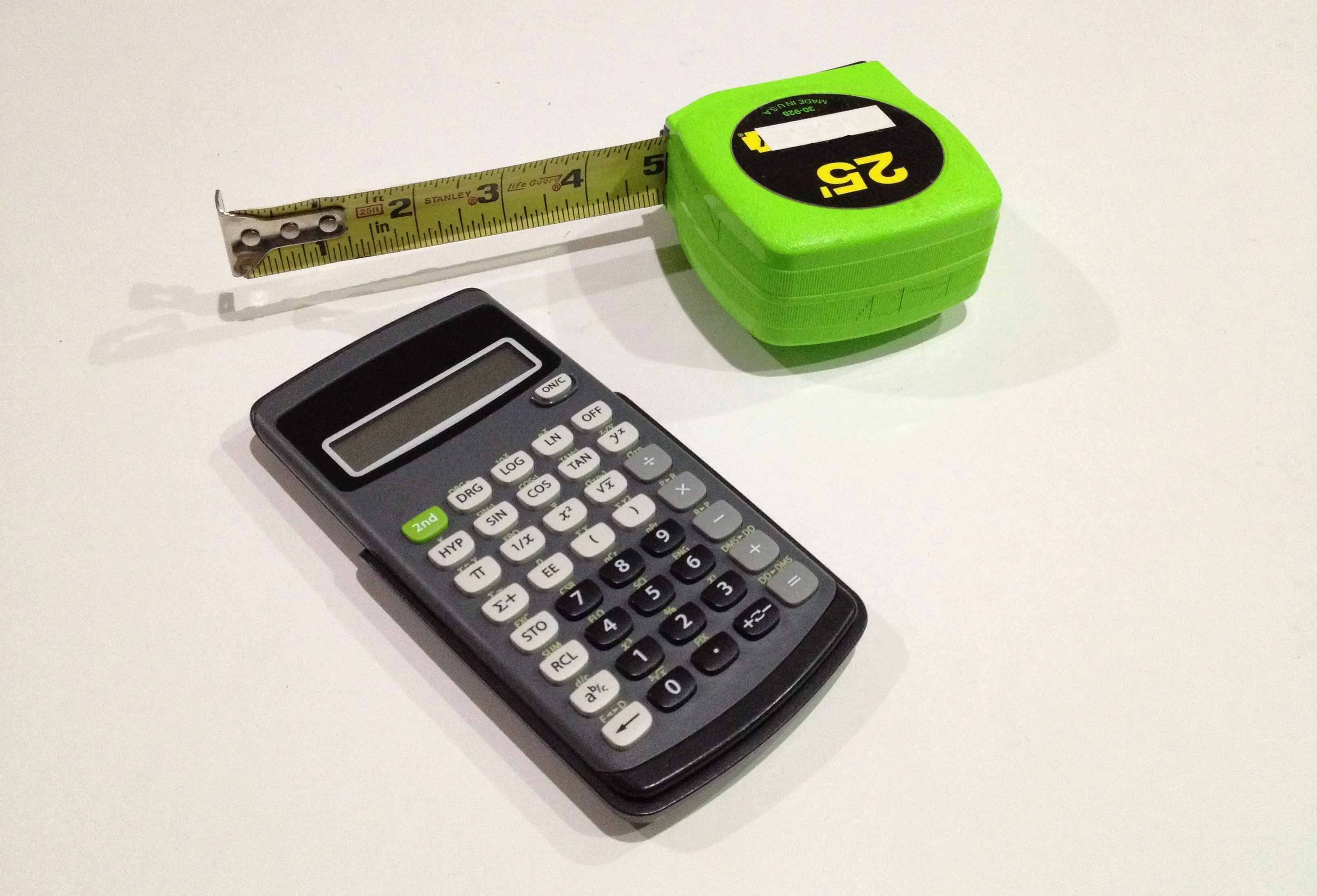 A calculator and a tape measure