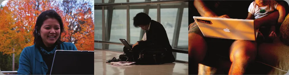 Na pierwszym planie uśmiechnięta kobieta w okularach stojąca w silnej pozycji z założonymi rękami. Na drugim planie przy stole znajduje się sześć osób. Można się domyślać, że omawiają jakiś projekt wyświetlony na monitorze jednej z osób.