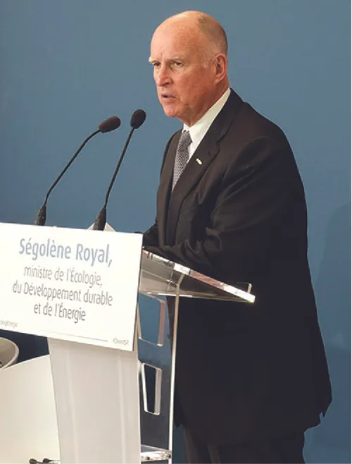 A photograph of Jerry Brown speaking from a podium.