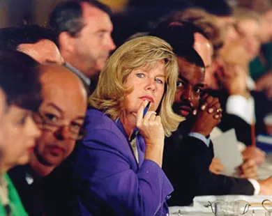 A photograph shows Tipper Gore seated at a table at a Senate hearing.