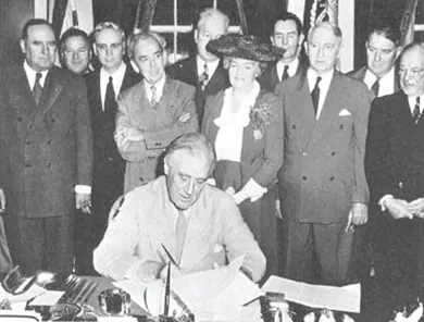 A photograph shows Franklin D. Roosevelt seated at a desk signing the GI Bill, surrounded by members of Congress.