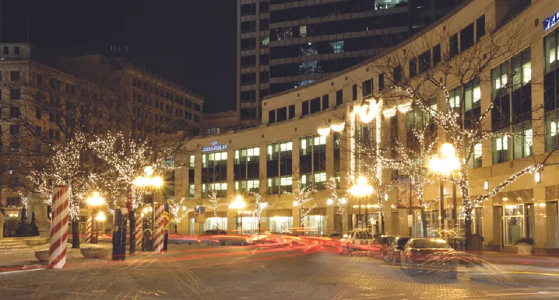 This image shows the Anthem Inc. building lit up at night.