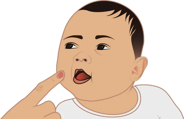 Image of infant turning its head toward a finger extended towards them.