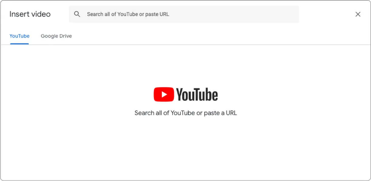 A screenshot of the Insert Video feature is shown with the YouTube icon in the center and the message Search all of YouTube or paste a URL.