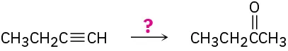 A C4 alkyne chain reacts in the presence of an unknown reagent represented as a question mark to form  methyl ethyl ketone.