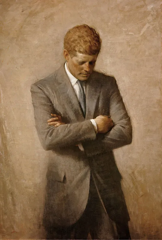 A painting of John F. Kennedy shows the president standing with his arms folded, staring downward.