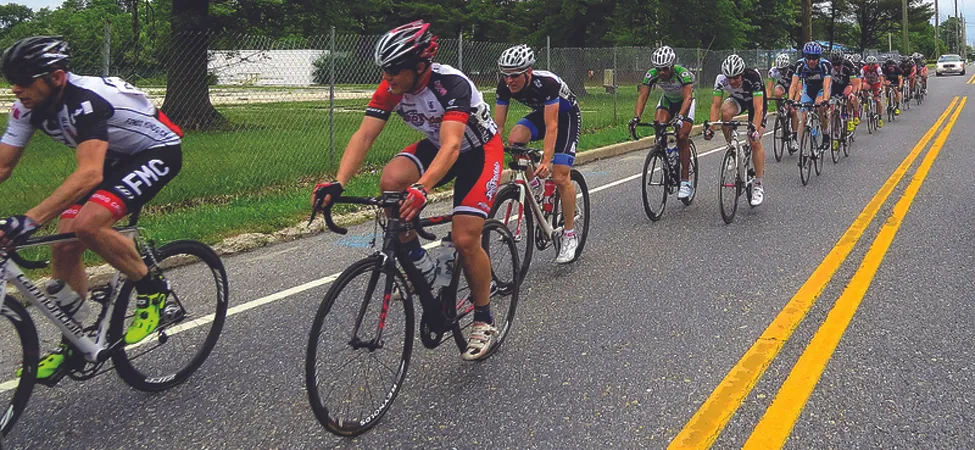 This photo shows a pack of cyclists in a road race.