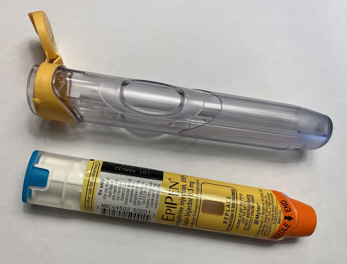 A photograph shows an Epipen Injector device.