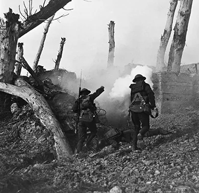 A photograph shows two U.S. soldiers running past fallen Germans on their way to a bunker.