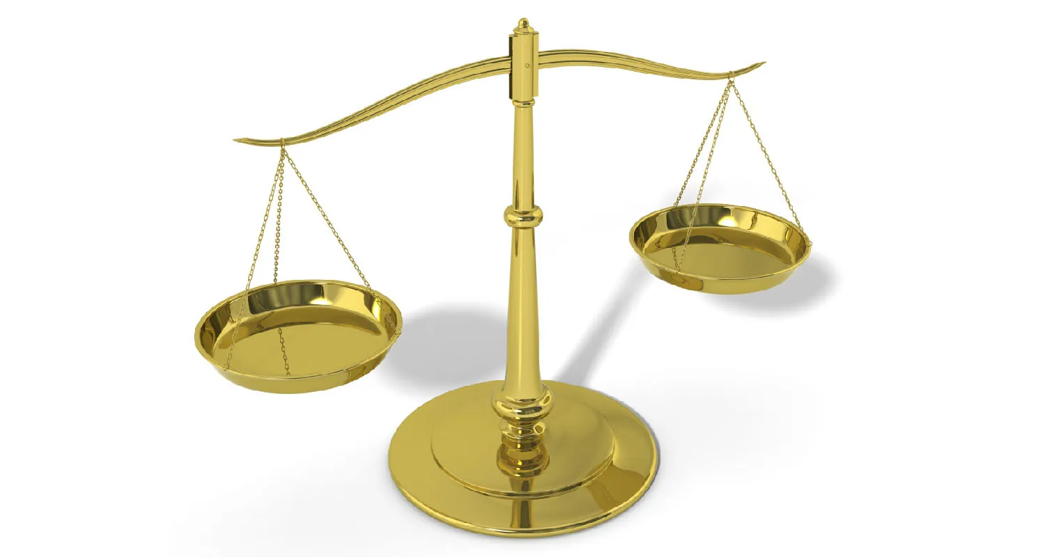Image of gold balance scale.