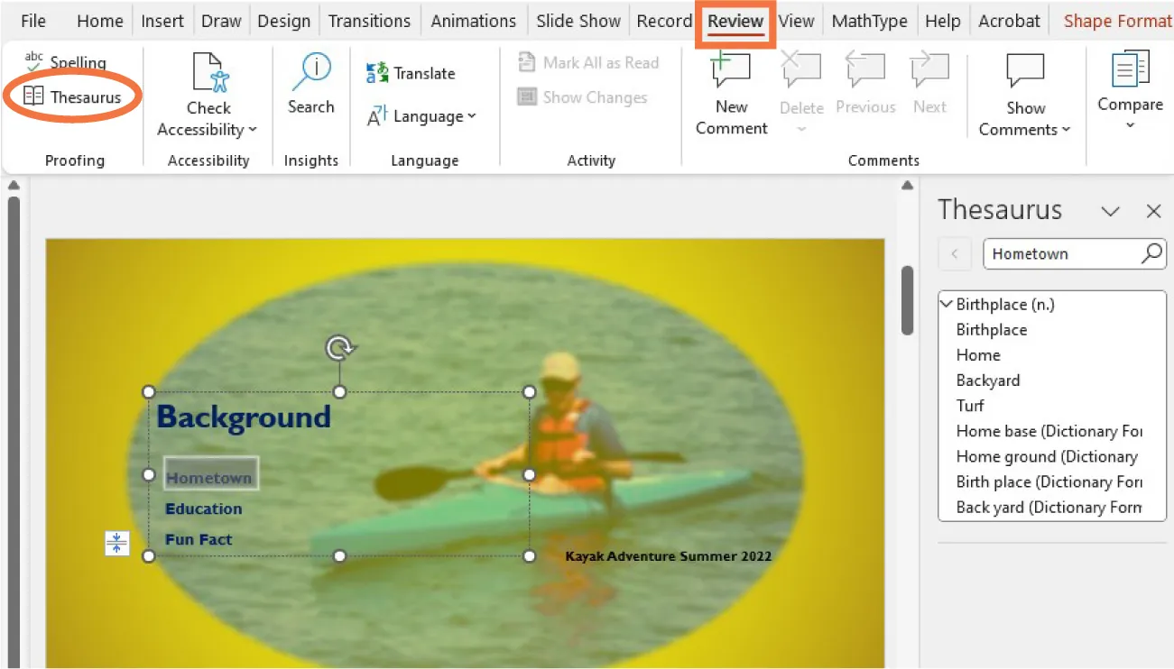 A PowerPoint screen with the Review tab selected is shown. The Thesaurus feature has been selected.