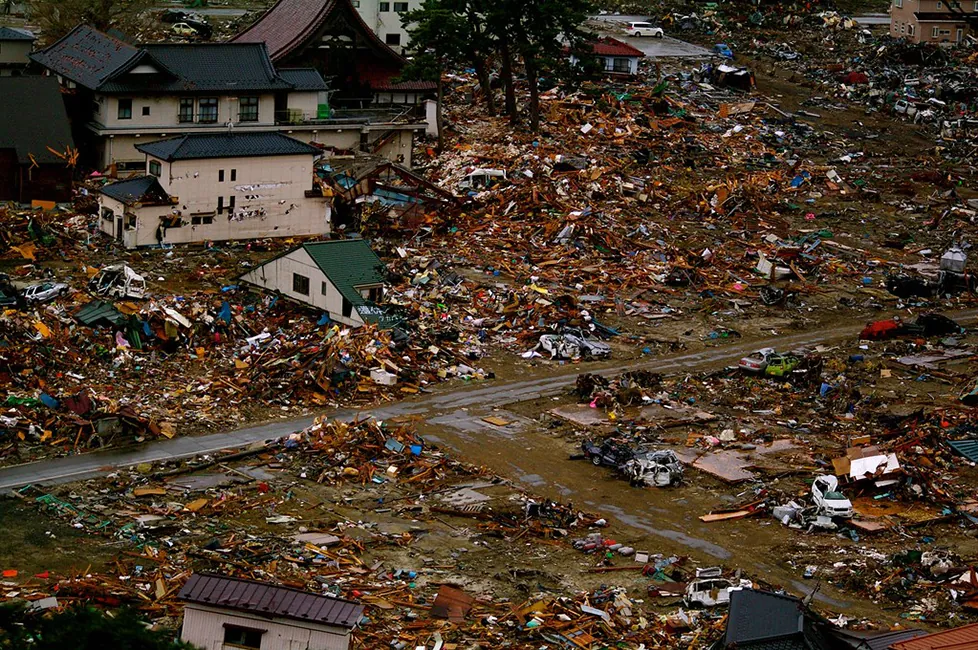The debris of destroyed buildings after an earthquake and tsunami.