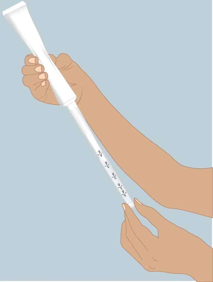 An illustration of a patient’s hands withdrawing vaginal cream from a white tube using an applicator.