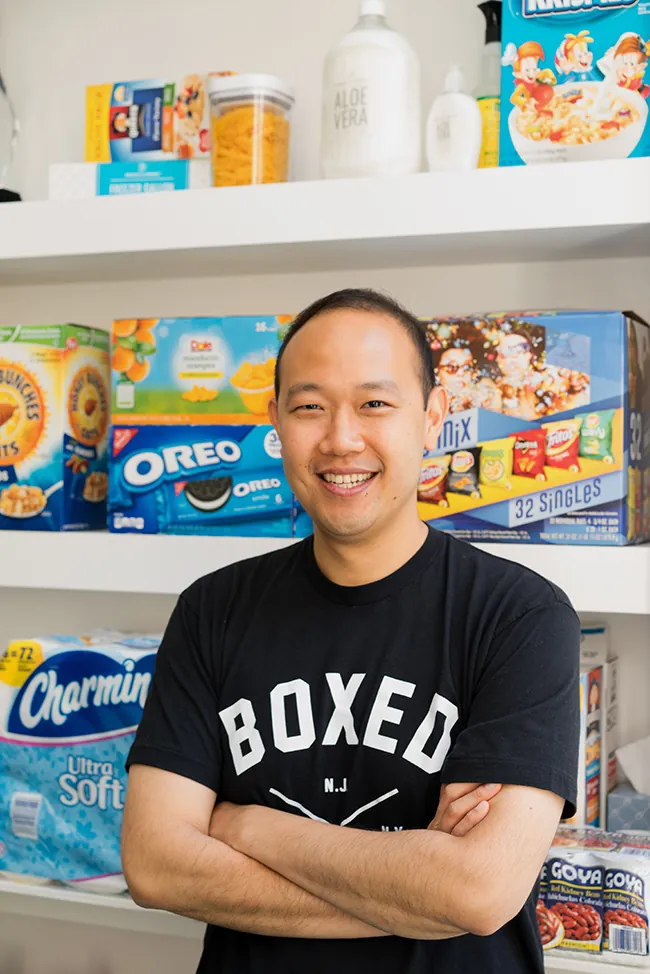 A photo shows Chieh Huang, founder and C E O of Boxed posing for the camera.