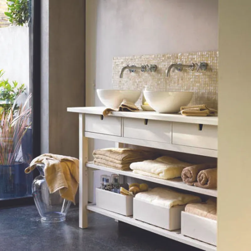 Photo of a IKEA storage system under a double sink.