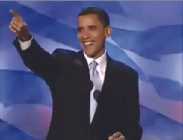 An image of a smiling Barack Obama with his right hand outstretched.
