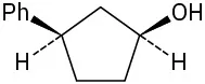 Five-carbon ring with phenyl (wedge) and hydrogen (dash) on a carbon, and hydroxyl (wedge) and hydrogen (dash) two carbons away, clockwise.