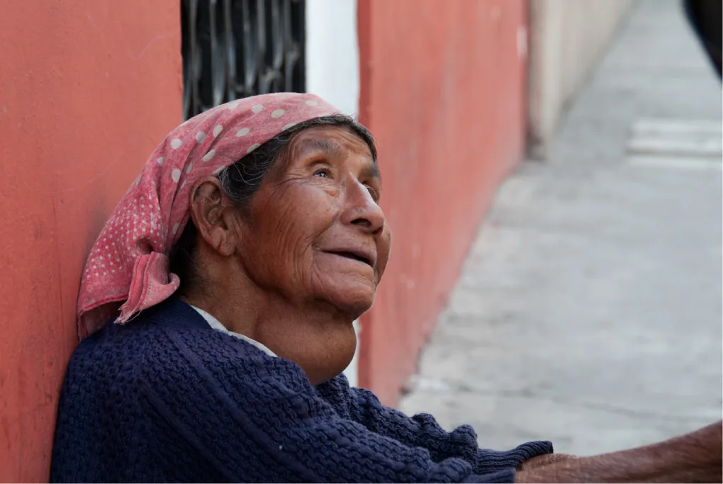 Photo of older individual with a large goiter at their neck.