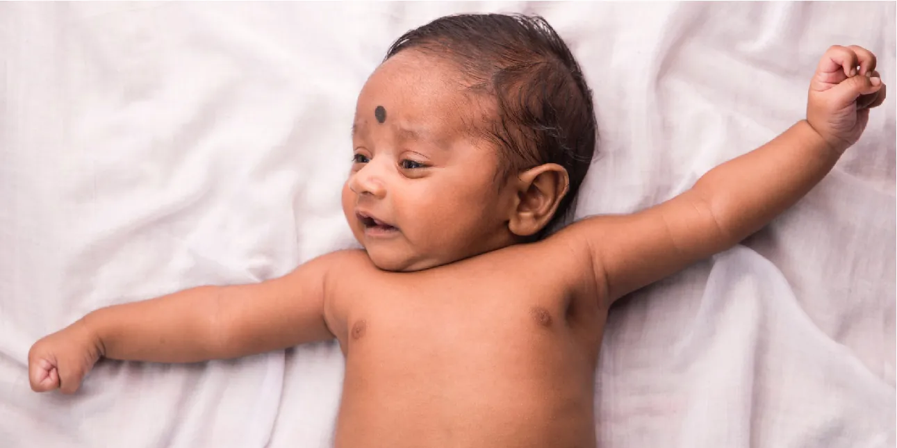 This photograph shows a newborn baby.