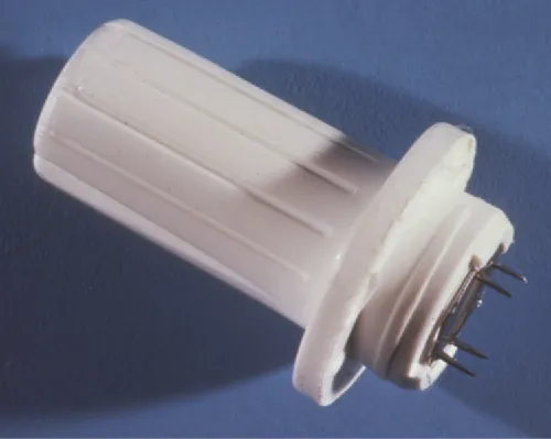 Photo of an object shaped like a bike handle with sharp projections on one end.