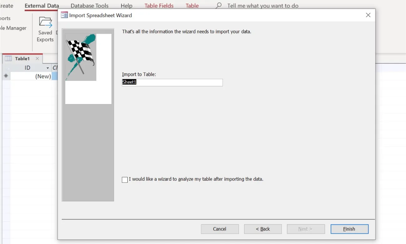 Import Spreadsheet Wizard window displays Sheet1 in Import to Table bar.