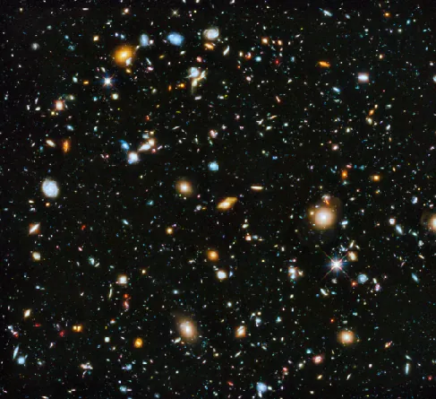 Hubble Ultra Deep Field. This remarkable HST image contains many thousands of galaxies of all morphological types uniformly spread over the entire frame.